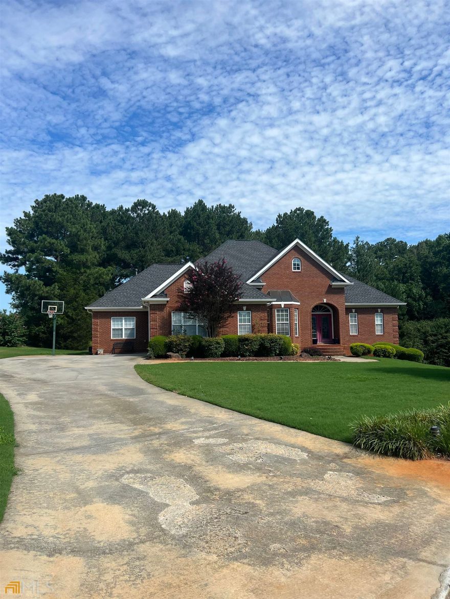 Beautiful, well kept, 3 sides brick, very large ranch home on beautifully full finished basement. Very open floor plan that shows the beauty of the home as you enter. As you enter the home, you are welcome to a beautiful open space with a large dining room on your left and a large living room with a cozy fireplace. You will then go into the spacious kitchen with a huge island and eat-in area with the very large family room. The kitchen is equipped with Cafe brand oven and microwave and beatiful white quartz countertop. The home Boast a large master on the main with cozy fireplace and walk-in closet. Master bath with extra large tub, oversized shower, dual sink with quartz countertop. Two large bedrooms are on the opposite side of the home with a teen/in-law suit upsatirs by itself. In the finished basement, there are tons of space, a gym, office, movie theater already done for your family, kitchenette. Roof only 5 years old. Large lot. Easy access to highway and shopping. Huge storage space in basement and attic. Side entry garage. Large deck for entertaining.A must see!