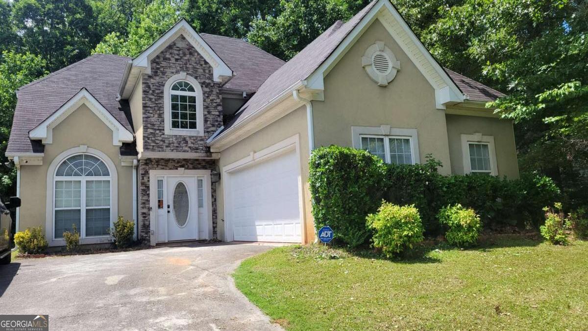 Don't Miss This One! Welcome to this stunning 3BR/2.5BA gem tucked inside the highly sought-after Wellington Oaks subdivision. The owner's suite is a true retreat, featuring a beautiful trey ceiling, walk-in closet, and a spa-like ensuite with a soaking tub and separate shower. Upstairs, you'll find spacious secondary bedrooms, a versatile bonus room perfect for a guest suite or entertainment space, and a convenient laundry room. Downstairs offers an inviting formal dining room, breakfast nook, and a cozy fireside living room ideal for gatherings. The mudroom off the two-car garage adds everyday functionality, while the kitchen comes fully equipped with appliances that stay. To top it all off, the home boasts a brand-new roof, giving you peace of mind for years to come.