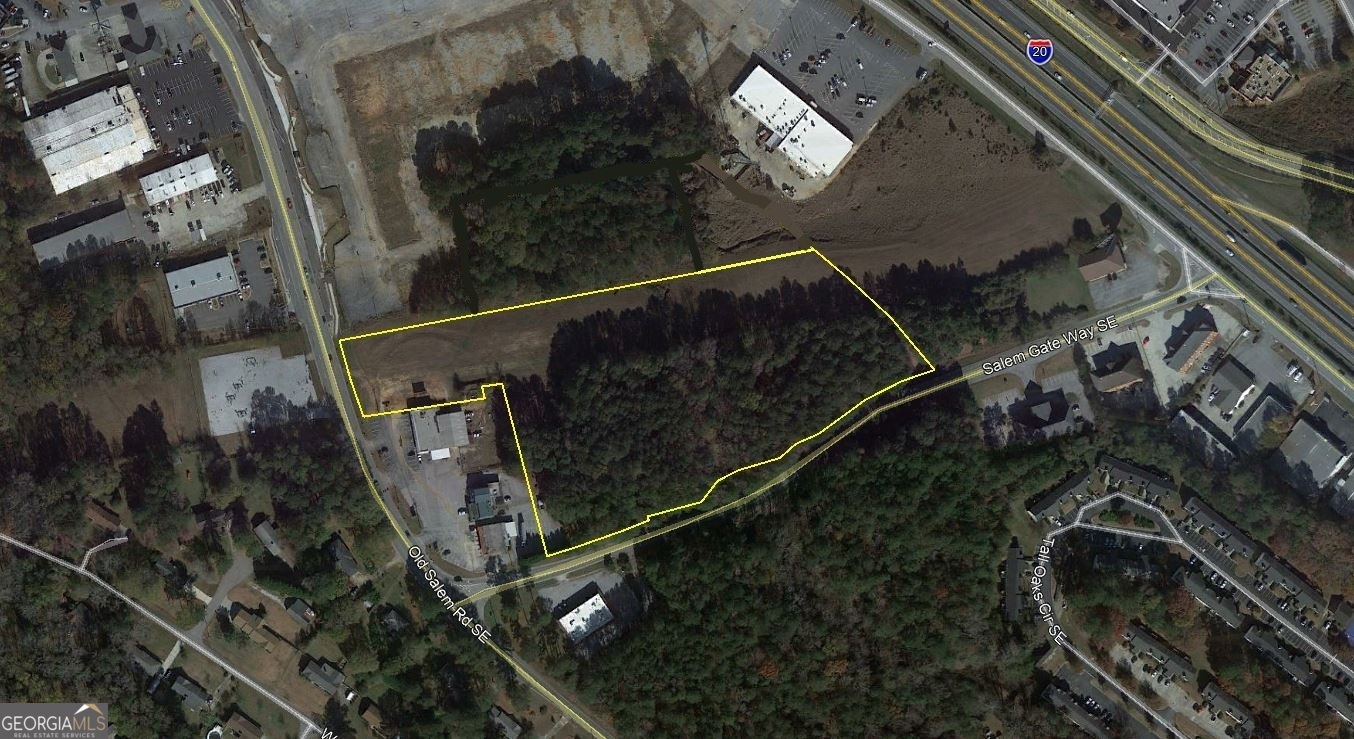 Situated just south of I-20 and adjacent to the Salem Gate retail redevelopment, this 8.515-acre parcel offers a prime opportunity for commercial development. The site features rolling, wooded terrain with all utilities available, making it suitable for various commercial uses such as retail, office, or service-oriented businesses.
