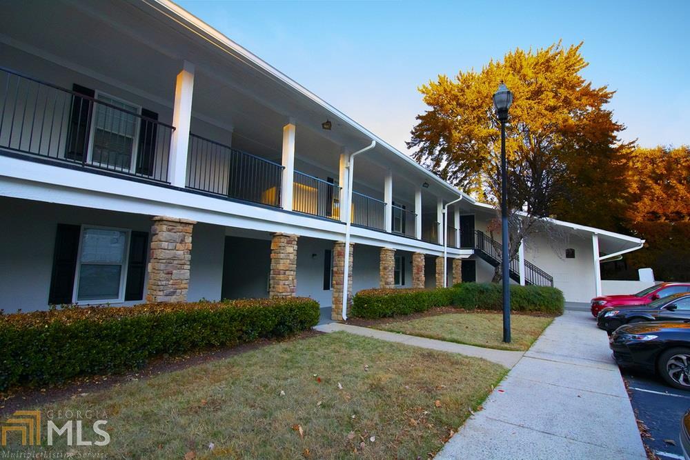 Newly Renovated Move In Ready Atlanta Condo within walking distance of shopping and dining! You won't find this great of a deal anywhere in the city! Freshly painted interior & exterior! Beautiful hardwoods throughout the main living space, & new carpet in the master. Open floor plan, separate dining area, spacious living room with a beautiful view through the french doors to the covered patio. This specific unit has the best view in the whole Community...overlooking the pool, beach volleyball court, and the beautifully manicured green space.