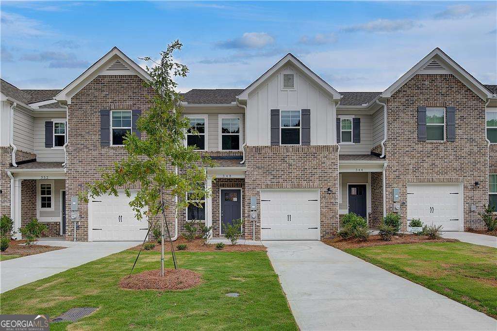 AVAILABLE NOW! Welcome home to our Avery Landing community in sought after McDonough by DRB Homes! No detail is left behind in this beautiful single-family townhome featuring an exquisite exterior. Our spacious Annalise floor plan features 3 bedrooms, 2 full bathrooms. Powder room, a flex room and an open layout on the main level. The stunning kitchen features an island with quartz counter tops and beautiful painted cabinets with a spacious pantry. Upstairs you will find a welcoming owners suite with a sitting area, large walk-in closet, shower, and double sinks. All appliances are included (stainless steel side by side frig., range, microwave, dishwasher and white washer and dryer). One car garage with opener and patio. Photos are of a decorated model. Please note: If the buyer is represented by a broker/agent, DRB REQUIRES the buyer's broker/agent to be present during the initial meeting with DRB's sales personnel to ensure proper representation.