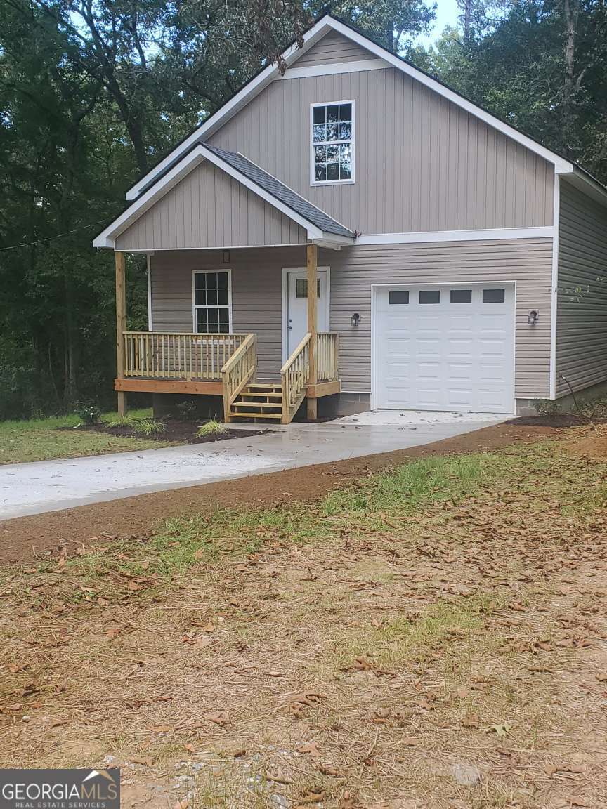 New 2 story craftsman style cottage on mature wooded lot close to I75 and Calhoun shopping. 9ft ceilings on main level. 3 bed 2 bath. With 1 car garage, laundry on 2nd floor, upgraded fixtures with ceiling fans in all beds and living room. Waterproof laminate throughout with tile in baths and laundry. All stainless steel appliances included with sale. Grilling deck and covered front porch. By appointment only!