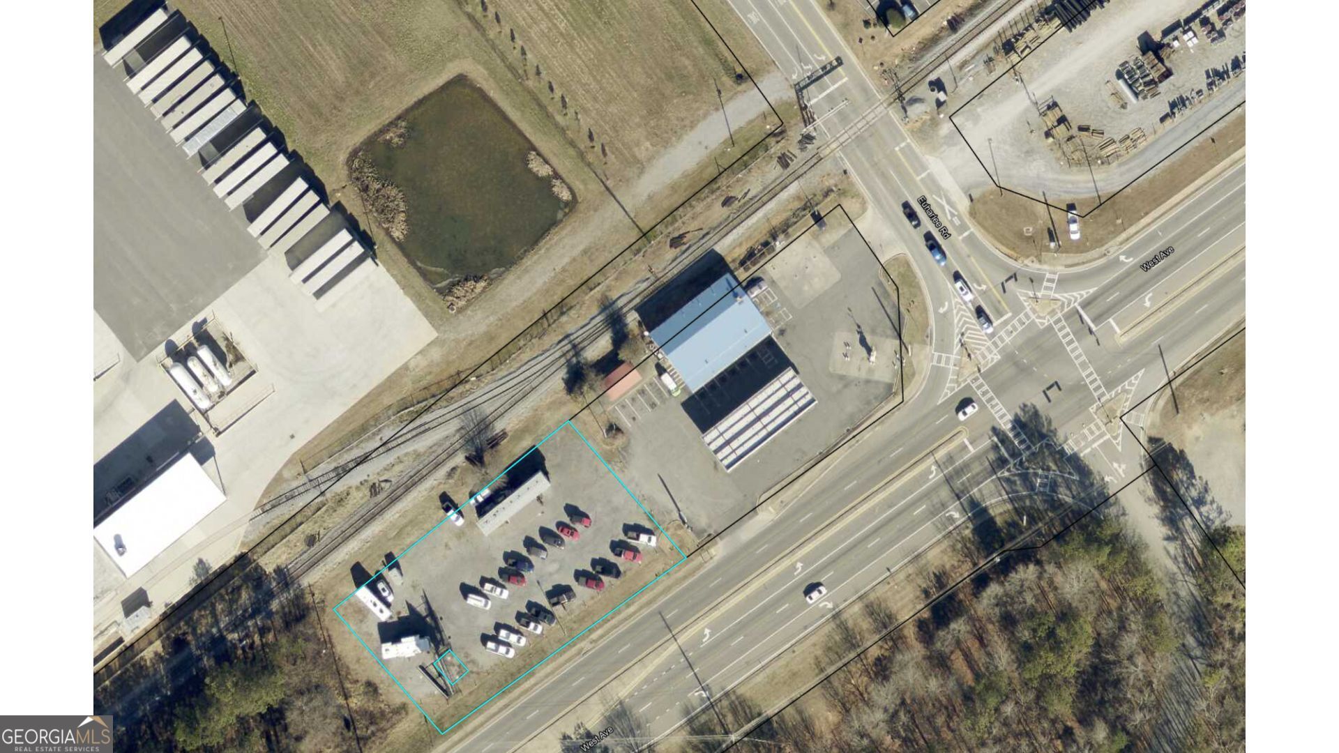 Level Commercial lot with great visibility and frontage on Hwy 113 just West of Cartersville. Currently being used as a car lot. Building on property is an office trailer with 2 offices and a bathroom and is included in the sale. The property offers the opportunity for a variety of business applications including storage lot to small retail facility. Billboard on the property is not included in the sale.