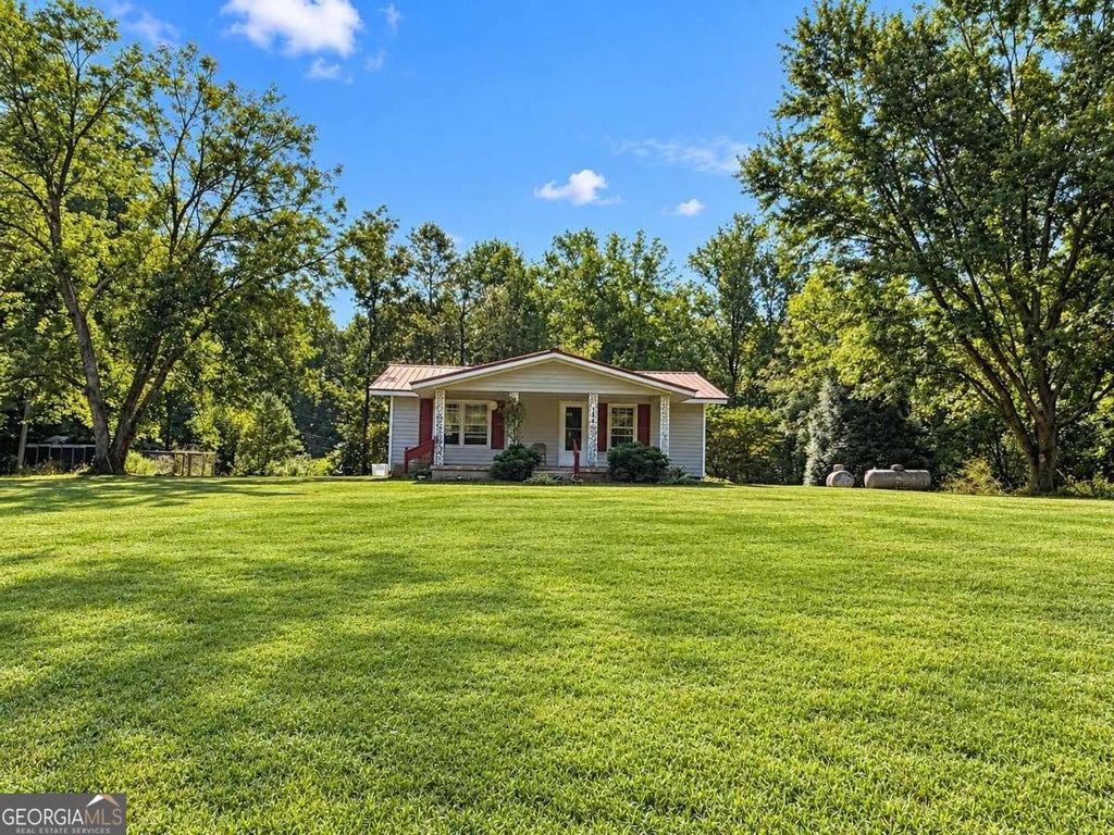 Photo of 724 Upper Bethany Road, Ball Ground, GA 30107 (MLS # 10840632)