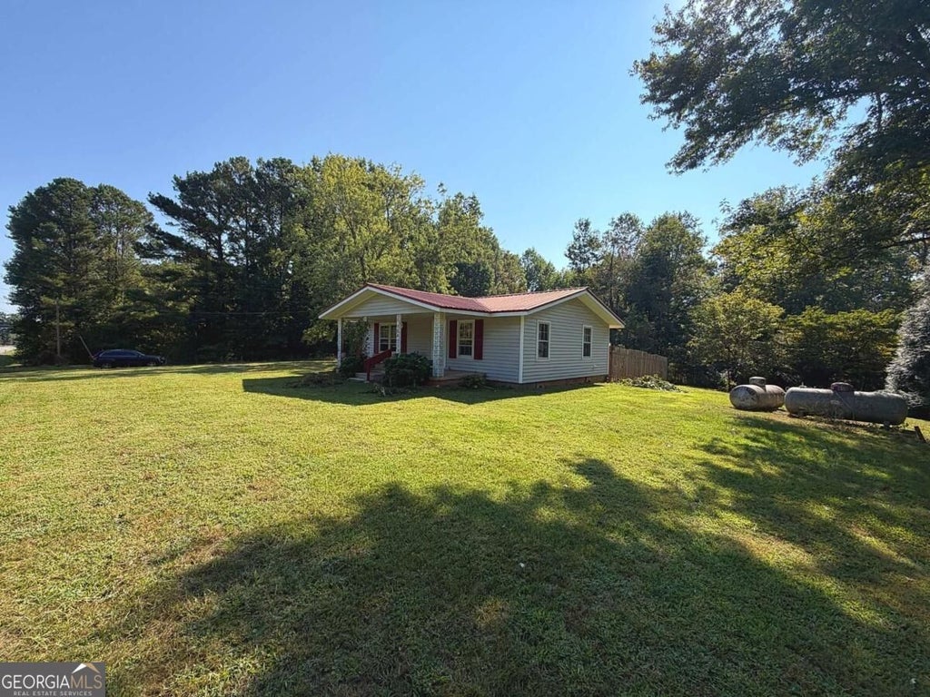 Photo of 724 Upper Bethany Road, Ball Ground, GA 30107 (MLS # 10840632)