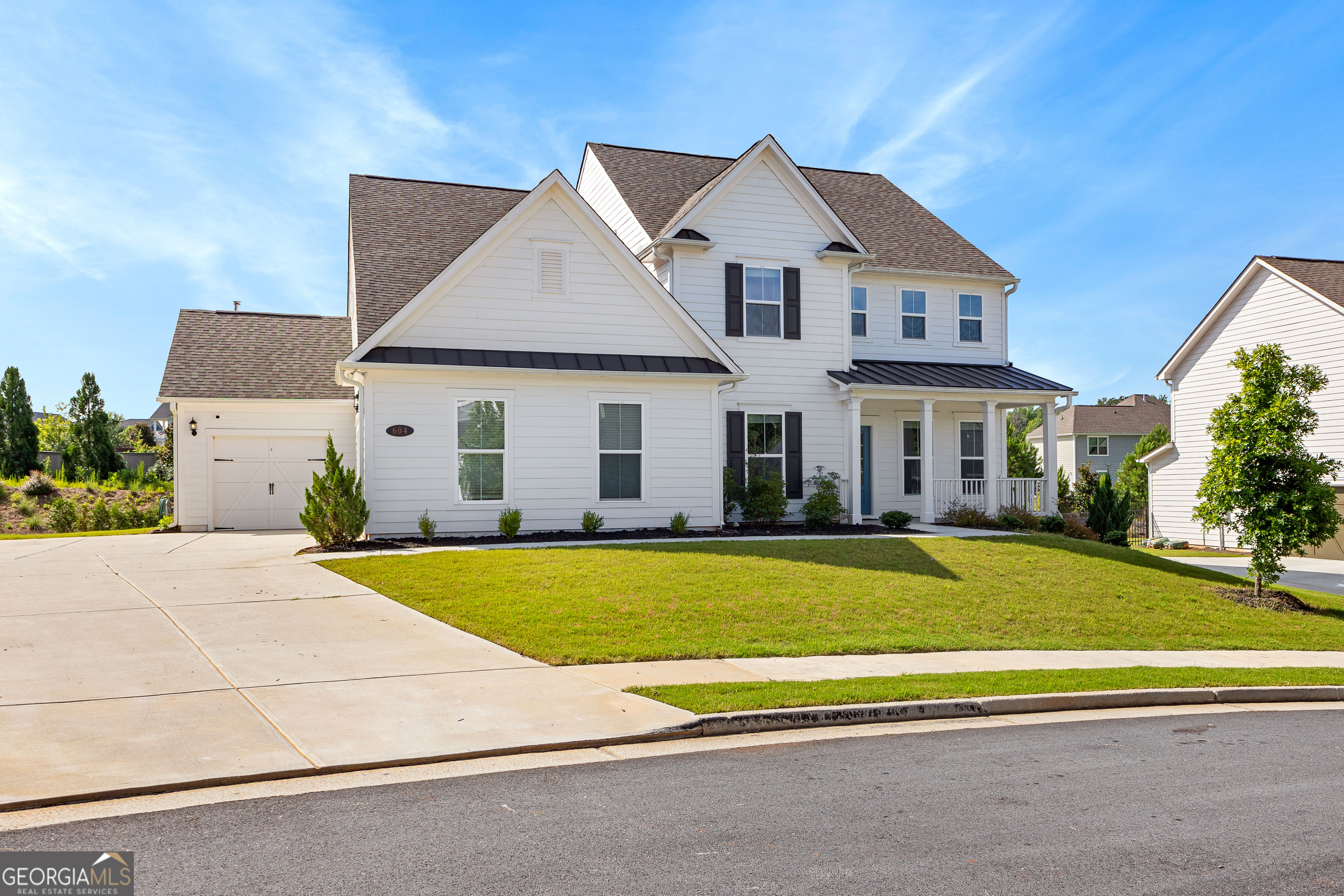 Live the Peachtree City Lifestyle in This Like-New Dream Home! Welcome to this beautiful, spacious 5-bedroom, 4.5-bath home in the heart of Peachtree City, where charm meets convenience. With 3,658 square feet of thoughtfully designed living space, this home offers room to live, work, and entertain in comfort and style. Step inside this like new home to discover a bright and open layout featuring a main-level office, cozy gas log fireplace, and a light-filled sunroom perfect for morning coffee or relaxing evenings. The chef's kitchen includes a large walk-in pantry, modern appliances, and plenty of space to gather. Guest room or secondary bedroom on main as well. Retreat to the oversized primary suite with a spa-like bathroom, complete with his and her walk-in closets. Every bedroom offers generous space and comfort for family or guests. Upstairs you will also find three secondary bedrooms and spacious laundry room. Outside, enjoy direct access to Peachtree City's famous 100+ miles of golf cart paths-just a short ride to restaurants, parks, and shopping. The home also features a 2-car garage plus a dedicated golf cart garage, making it easy to explore the city in true PTC style. Don't miss this rare opportunity to own a like-new home in one of Georgia's most beloved communities. Schedule your private showing today!