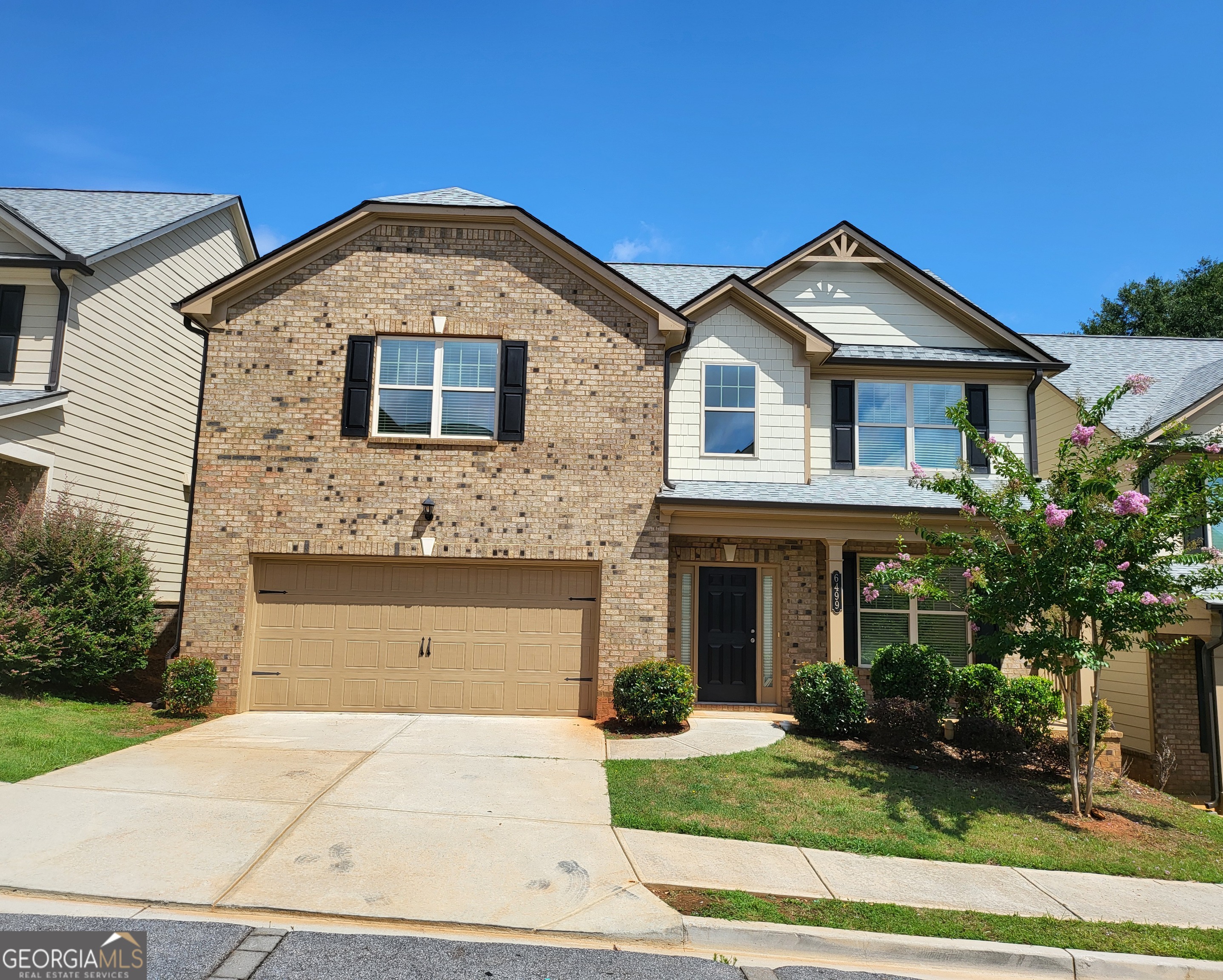 Beautiful 5BR/3BA Luxury Home for Rent - Across from Heritage Golf Course! Only 4 years old, this stunning two-story single-family home offers spacious and modern living in a highly desirable location! Just 5 miles from I-85 and Jimmy Carter Blvd, this home provides both comfort and convenience. 5 Bedrooms, 3 Full Bathrooms, Grand two-story foyer with high ceilings, Separate formal dining room, Gourmet kitchen with shaker-style white cabinets, granite countertops, Brand-new dishwasher and microwave, Spacious living room with a cozy fireplace, Guest bedroom and full bath on the main level, Brand-new hardwood flooring in the family, dining rooms, and guest bedroom. Hardwood floors throughout the main level, Oversized master suite with four large walk-in closets, Three generously sized secondary bedrooms upstairs. Refrigerator, washer, and dryer included in rent. One-year or long-term lease available. Excellent location close to shops, dining, and major highways. *Please remove your shoes when entering the home. The house has been professionally cleaned.* Don't miss this exceptional rental opportunity in a prime location!