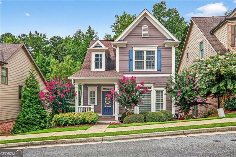 Discover this enchanting Craftsman-style home nestled just minutes from downtown Acworth's inviting community and historic charm. Freshly painted inside, it welcomes you with warmth and character. The interior offers three spacious bedrooms upstairs and a basement with ample opportunity, fireplace, and two car garage. Step onto the covered back deck with sleek metal roofing-the perfect outdoor retreat. A covered terrace patio with a refined metal ceiling provides a bright and protected extension of living space. Venture into the landscaped backyard, where a stone fire pit and intimate sitting area make evenings magical and memorable. Combining architectural charm with thoughtful modern upgrades and an unbeatable location near shops, lakes, parks, and dining-this home is a rare find and a true gem. Charleston Park offers a quiet neighborhood with a full playground and nature trails perfect for exploring all that Acworth has to offer!