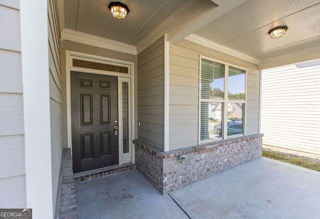 Photo of 7759 Hansel Lane, Lithonia, GA 30058 (MLS # 10765483)
