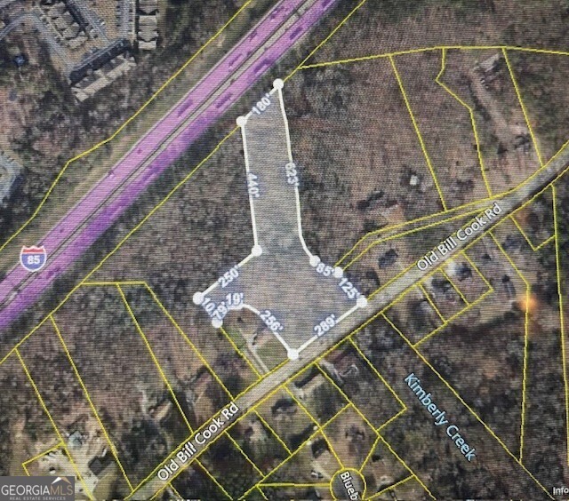 Looking for acreage in the growing South Fulton area? This parcel offers an affordable opportunity for buyers looking to build a private home, family retreat, or investment property. There is no survey on file, so buyers are encouraged to complete their due diligence. Zoned AG1, the land allows for one home per acre, and there may be potential for rezoning depending on your plans. Public utilities are nearby-including water, gas, and sewer (with sewer access at next door properties). Property sits between 5887 and 5865 Old Bill Cook Rd. Conveniently located just 3.8 miles from Hartsfield-Jackson Atlanta International Airport and 2.4 miles from the Chick-fil-A Support Center. Also close to schools, parks, shopping, and major travel routes.