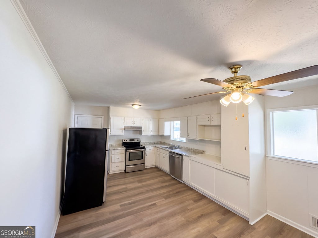 Photo of 5807 Cobbrook Drive, Ellenwood, GA 30294 (MLS # 10867357)