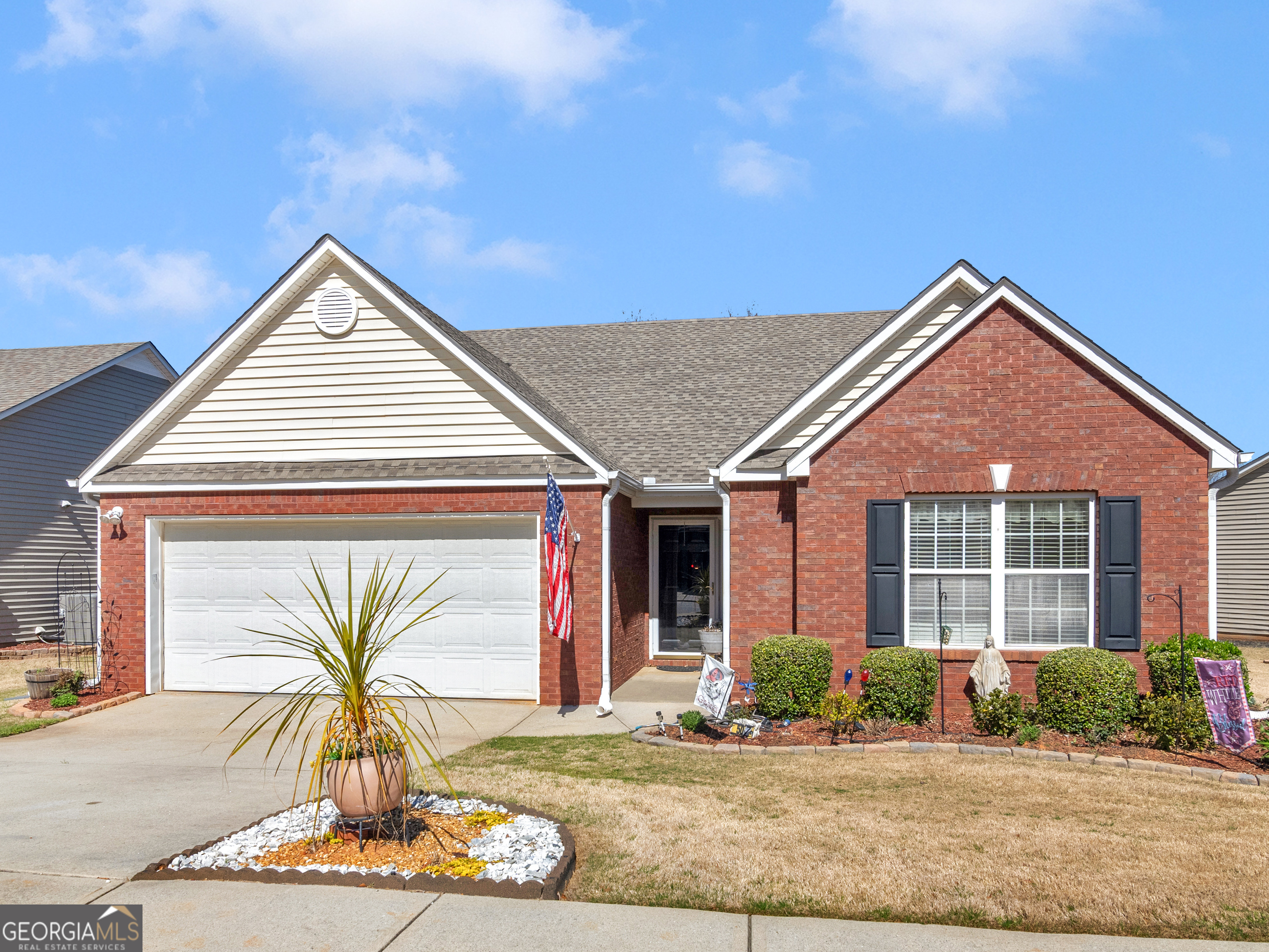Charming Ranch-Style home in a Premier 55+ Community in Loganville Ga. Welcome to this highly sought-after three-bedroom, two-bath ranch style home in one of Walton County's most desirable 55+ communities. Designed for comfort and easy living, this home offers a spacious and open floor plan, perfect for entertaining and everyday relaxation. Step inside to find a bright and airy living space featuring vaulted ceilings and elegant finishes. The well appointed kitchen boasts modern appliances, ample cabinetry, and a convenient large breakfast/dining area. The primary suite offers a peaceful retreat with a roomy bath and large walk-in closet. two additional bedrooms provide space for guests, office, or hobbies. Enjoy low maintenance living with a beautiful landscaped yard and private enclosed patio, ideal for morning coffee or evening relaxation. Community amenities include clubhouse access and lawn maintenance. Conveniently located near shopping, dining, and healthcare, this home offers the perfect blend of comfort, convenience, and community. Don't miss the opportunity to make this exceptional home yours! Ask how you can receive up to $1500 credit by using one of our preferred lenders.