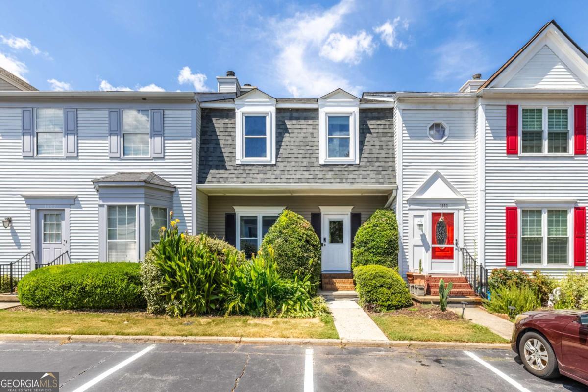 Fully renovated 2b2.5b townhome in the heart of Johns Creek. Top schools. This beautiful property features fully renovated kitchen with new tile flooring and cabinets, fully renovated bathrooms, new flooring and fresh interior and exterior paint etc. Roof and gutters replaced in 2019. New energy efficient windows installed in 2020. Water heater replaced in 2018. The open main level makes for easy living and features a customized storage closet and half bath. In the kitchen you'll find a pantry, ducted kitchen vent hood, plus newer electric stove (installed in 2024 and can be converted to gas stove easily with installed gas line) and dishwasher (installed in 2023). Don't miss the extra storage closet and utility closet off the deck too. Wood tiled deck also overlooks well-kept common green space that's ideal for entertaining friends or having a relaxing moment to yourself. Two master suite sized bedrooms upstairs await. Each with its own full bath and walk in closets with customized closet systems for plenty of storage! Tv in the bedroom and all windows curtains stay. All hardwood flooring throughout. No carpet at all. Ev charger is ready for your electric car. Two assigned parking spots at the front plus over 15+ guest parking near swimming pool area. Morningside at the Park is a 45 units' community with swimming pool and sidewalks. HOA covers water & sewer, mosquito service, community ground maintenance and landscaping. One step away from Morton Rd Park and State Bridge Pocket Park, walking distance to convenience store and North Bridges Shopping Center, 5 mins to Kroger & Daiso, 10 mins to Avalon offers a range of options for entertainment and relaxation. Rental restrictions. Owner of property MUST be resident of property per HOA Covenants.