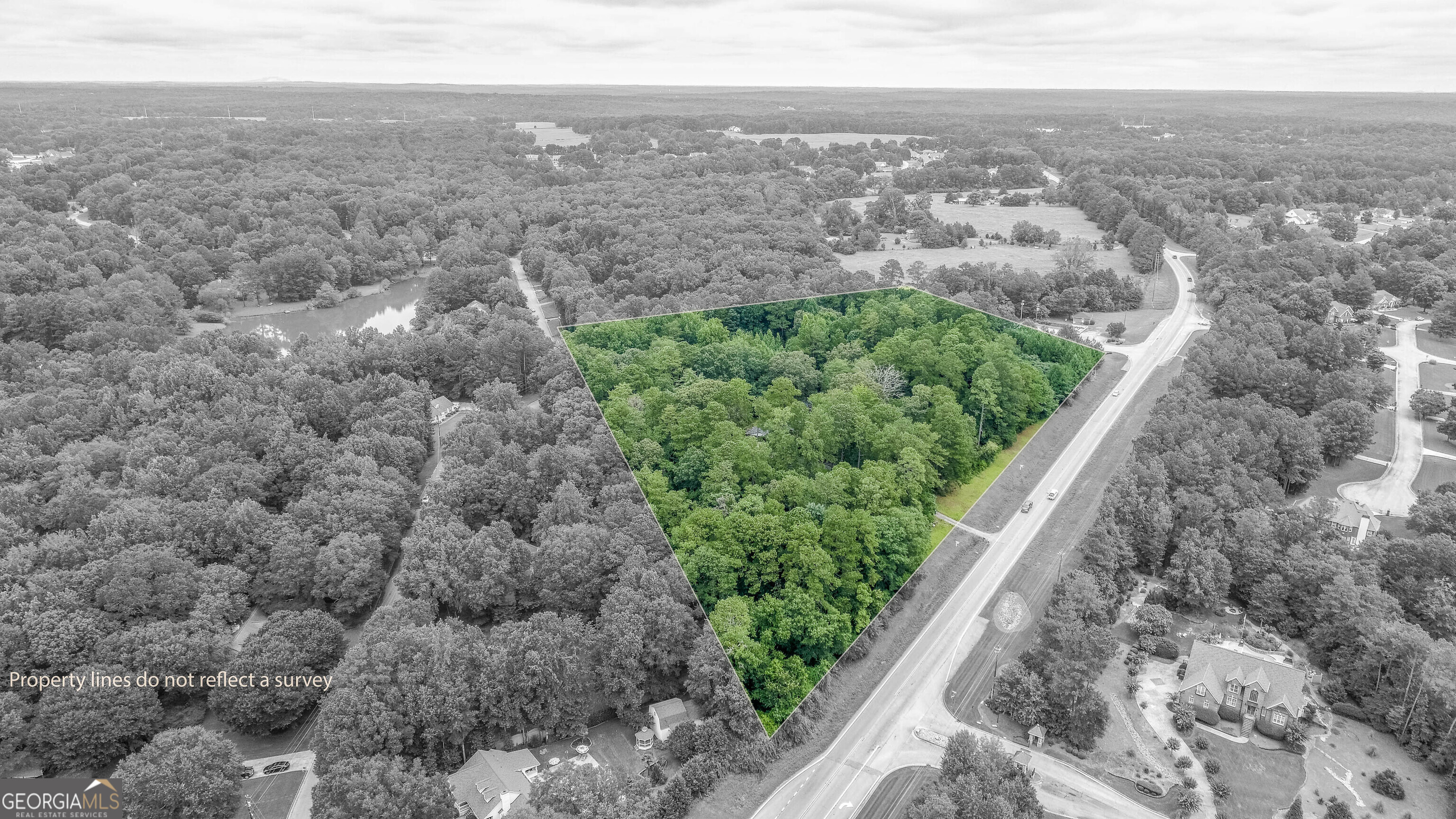 Don't miss out on this rare piece of commercial property zoned C-2. 8.68 commercial acres on Highway 20 in McDonough. Tons of road frontage and includes a house to turn into an office. Tons of potential. Reach out today to take a look!!!