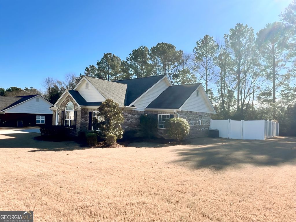 Photo of 220 Brookstone Drive SW, Calhoun, GA 30701 (MLS # 10786086)