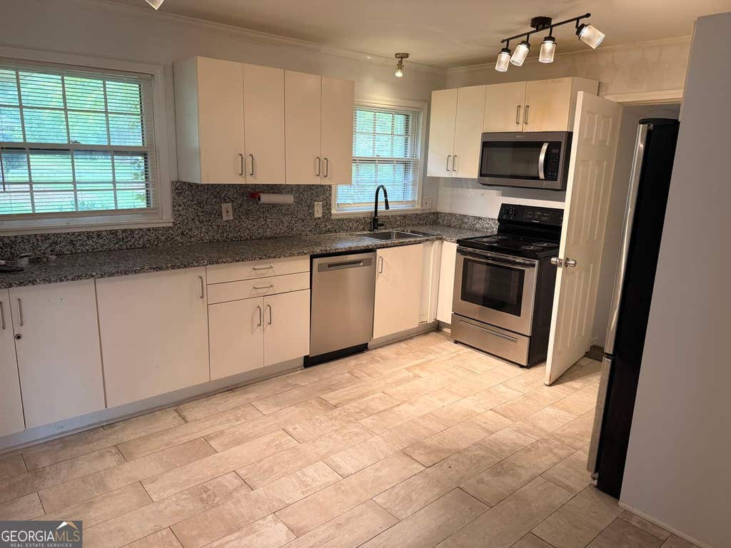 Photo of 2677 Lancaster Drive, Atlanta, GA 30344 (MLS # 10790254)