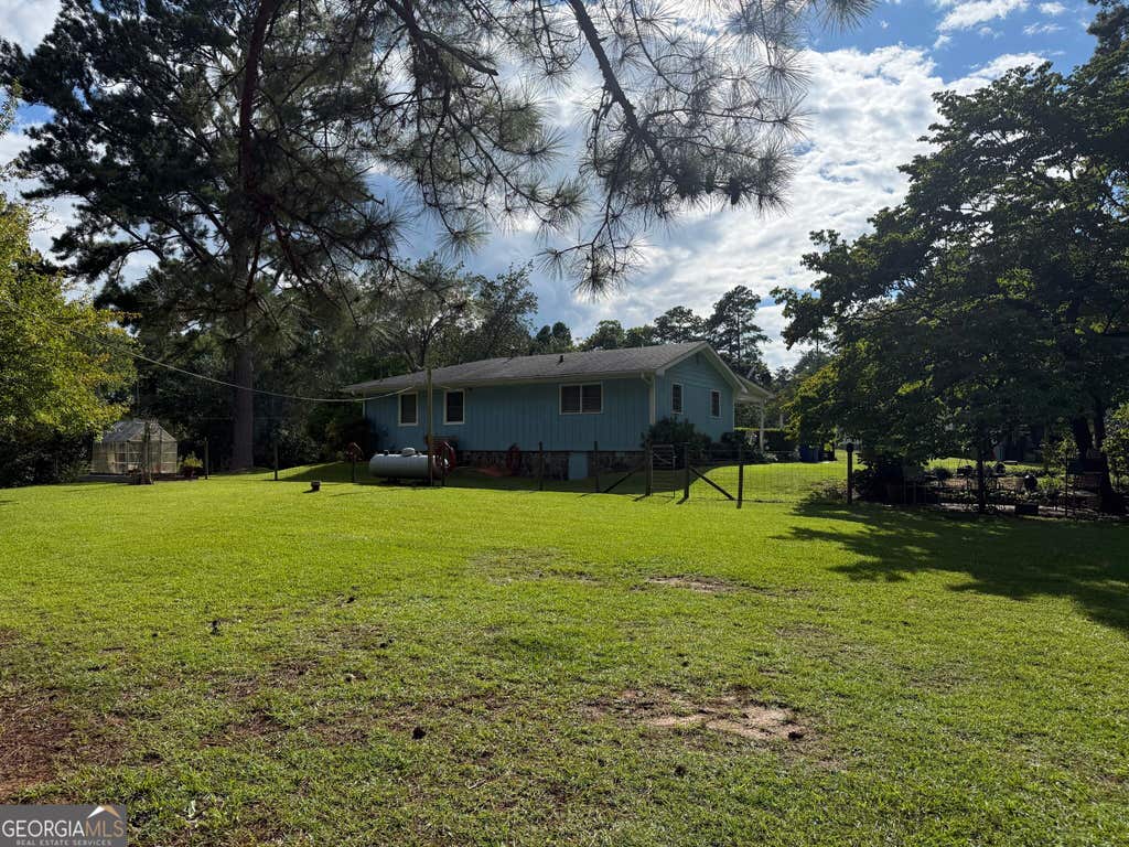 Photo of 9010 Clark Road, Fairburn, GA 30213 (MLS # 10821091)