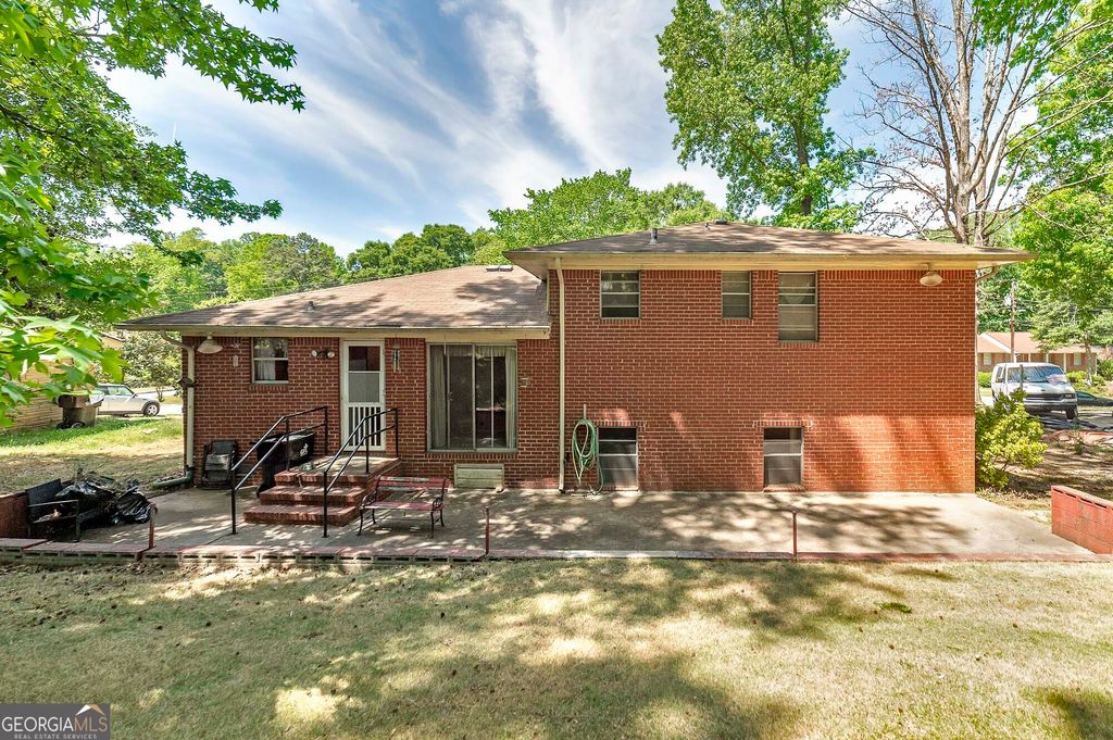 Photo of 6056 Morrow Cove, Morrow, GA 30260 (MLS # 10740915)