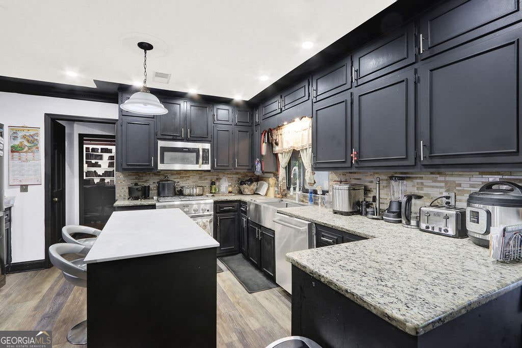 Photo of 714 Wetherborn Place, Stone Mountain, GA 30083 (MLS # 10830926)