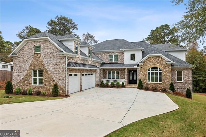 Newer construction in top rated Walton school district. Don't miss out on this incredible masterpiece that truly offers a room for every need. The inviting and welcoming two story foyer sets the stage for all that this fine home has to offer. Walking into this masterpiece, you have a home office area to the right of the foyer. This room could easily be used as an additional sitting/living room if needed. There is an incredible two story great room with fireplace featuring custom stone work all the way to the second floor. The great room has beautiful French doors opening onto an exquisite patio overlooking the completely private and level back yard. The gourmet kitchen is a chef's dream come true featuring all top of the line appliances and a Sub-Zero refrigerator. Enjoy informal meals at the breakfast island bar in addition to the breakfast 'room' area adjoining the family/keeping room with fireplace. The gourmet kitchen features a true walk-in pantry. There is an extra large laundry room on the main level and a mudroom area as you enter through the back door from the three car garage. The primary suite is on the MAIN level and is extra spacious. The ceiling like other ceilings throughout this fine home features special cove lighting. The primary suite features a fireplace and door leading to the exterior patio. The spa-style primary bath is palatial with large walk-in shower and separate soaking tub. The closet space is very good. Upstairs are four full secondary bedroom ensuites. All secondary bedrooms are very spacious. One of the secondary bedrooms could easily serve as a second junior primary suite. The second floor also features a wonderful option for a homework center/extra sitting area. There is a front and rear staircase. The color selections and designer touches throughout this fine home are second to none. If you are looking for a quality house to call home in the Walton school district, you do not want to miss taking a look at this fine property. The unfinished basement offers ample space to create whatever your future needs might be. The yard is very private. No HOA rule/regulations to worry about.