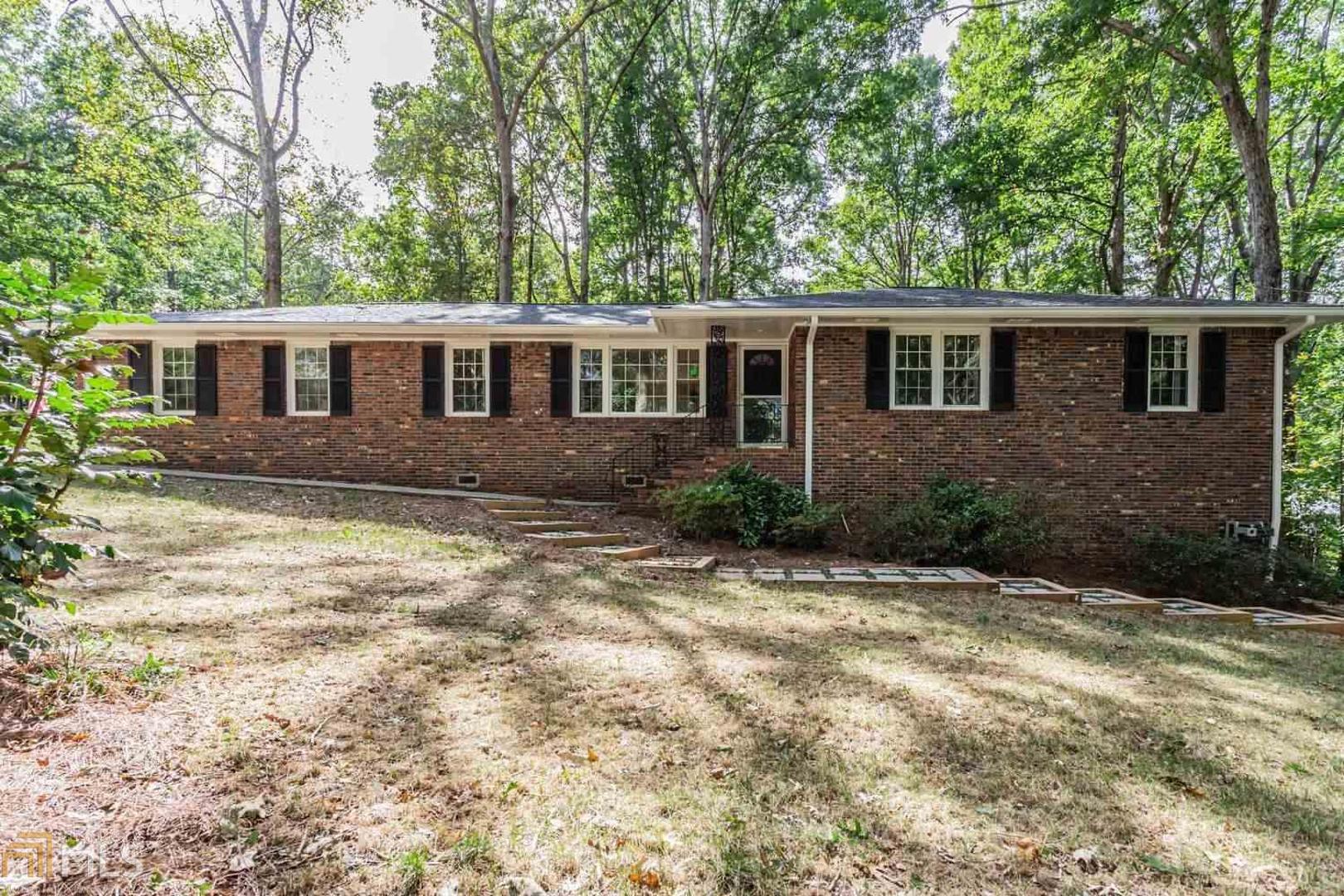 Your buyers will love this charming cute brick ranch with updated kitchen. Located in well established Duluth neighborhood. Home sits on a large corner lots with no HOA. This home features spacious open floor plan with hardwood floors throughout & in 3 bedrooms. The master bedroom has private bath w/tiled shower stall. Two additional spacious guest bedrooms will share the full bath located in the hallway. Kitchen features granite countertops, stainless steel appliances, backsplash & plenty of cabinetry for storage.