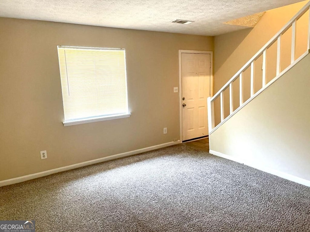 Photo of 120 Meadowbrook Court #UNIT A, Fayetteville, GA 30215 (MLS # 10877619)