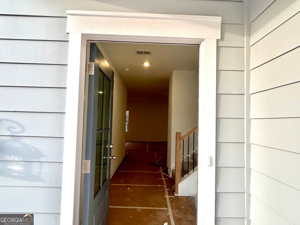 Photo of 5376 Heron Bay Boulevard, Locust Grove, GA 30248 (MLS # 10698348)