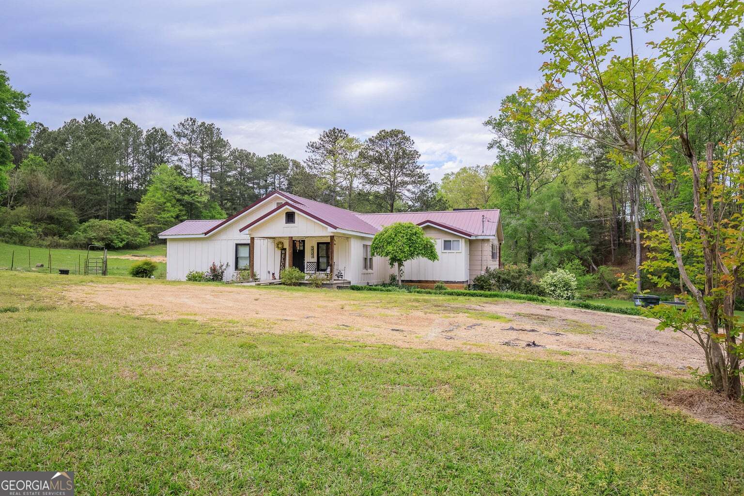Check out this 3 bedroom, 2 bath farmhouse with approx. 6 acres with stocked pond located in S. Walker County. This property offers good land space, if you are looking to have a mini-farm. The kitchen/dining/breakfast area is all open and very spacious. Laundry is located off of the kitchen. Living room boasts a beautiful brick, gas log fireplace and access to the partial basement with a small bonus room. Would be ideal for storage, work out room, etc. The front porch is covered and at the back of home, you will find a spacious, open deck perfect for entertaining or enjoying your morning coffee while overlooking the beautiful pond. As an added bonus, the workshop/building on the property offers ample space for additional storage, workshop, crafting, etc. Owner has made some renovations such as adding the second bathroom, stairway to basement from interior of home, wood siding on front of home, etc. This home and land have so many possibilities. Call today to schedule a private viewing!