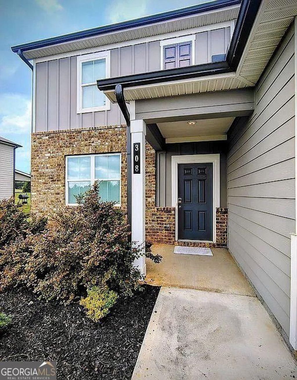 Photo of 308 Jade Laurel Lane, Locust Grove, GA 30248 (MLS # 10671166)