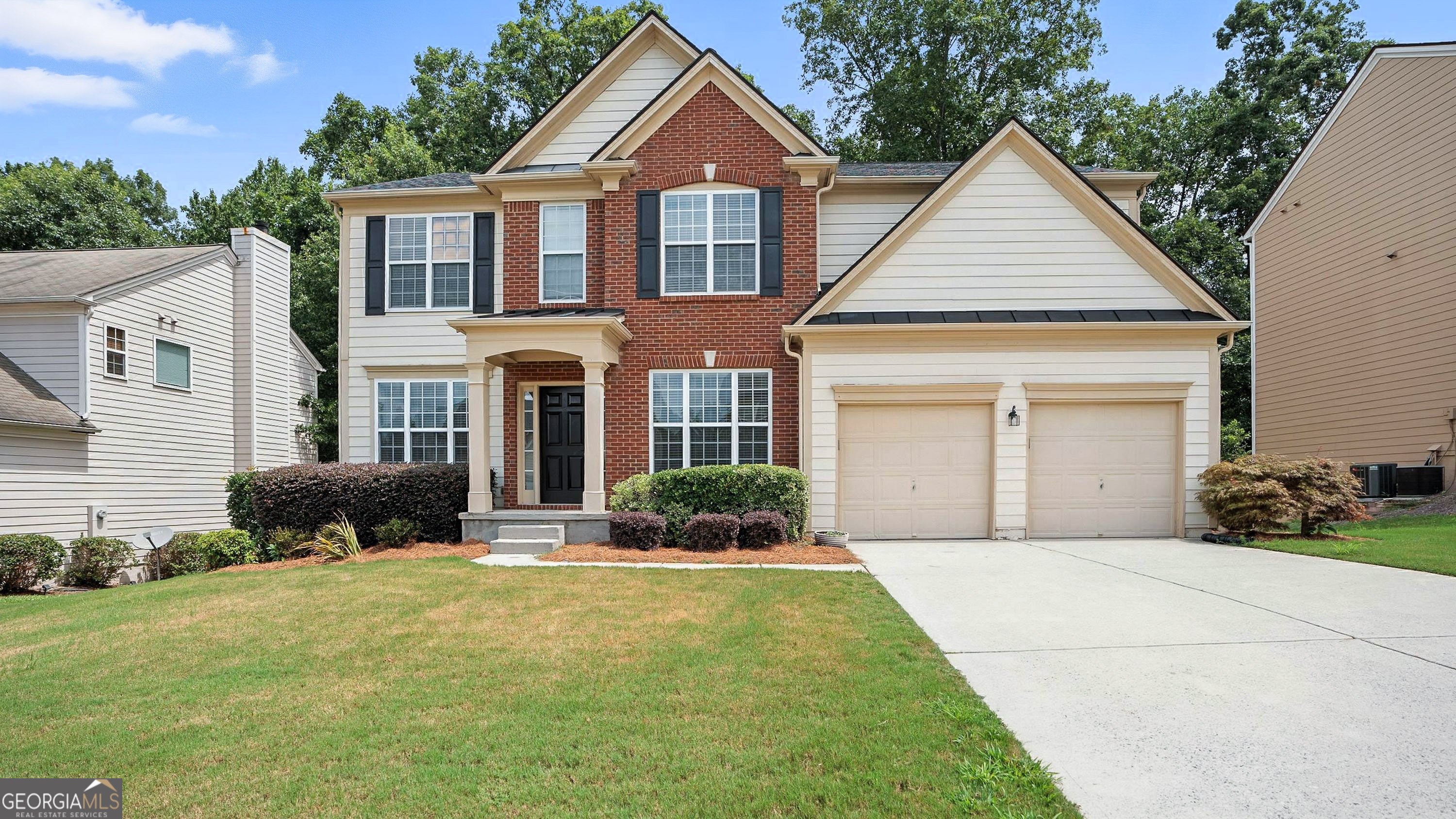 This stunning 5-bedroom, 3.5-bath home features soaring ceilings, wood floors, and a striking fireplace that extends to the second floor. Enjoy fresh interior paint, new carpet, a new kitchen sink, and a stainless steel appliance package including range, microwave, and dishwasher.