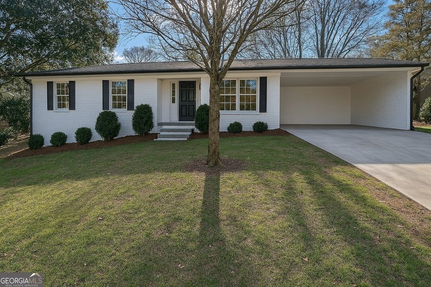 Imagine calling this beautifully renovated brick ranch in sought-after East Cobb, Marietta your new home. Forget the hassle of renovations Co it's already done! Step inside onto gleaming hardwood floors that flow through the spacious, open main living area. You'll find three comfortable bedrooms and two fully updated bathrooms with modern fixtures and tile on this level.  The heart of the home, the kitchen, is brand new with stylish cabinets, a lovely backsplash, and durable countertops. Need more space? The finished basement is a fantastic bonus, offering a large rec room, another bedroom, and a full bathroom Co perfect for guests, a home office, or a play area!  Outside, enjoy coffee on the front porch or host barbecues on the back patio overlooking the yard. Located in a top-rated school district and close to parks, shopping, and dining, this home offers the perfect blend of comfort, style, and convenience. Don't miss this chance for a truly move-in-ready home in a prime location! Schedule your visit today.
