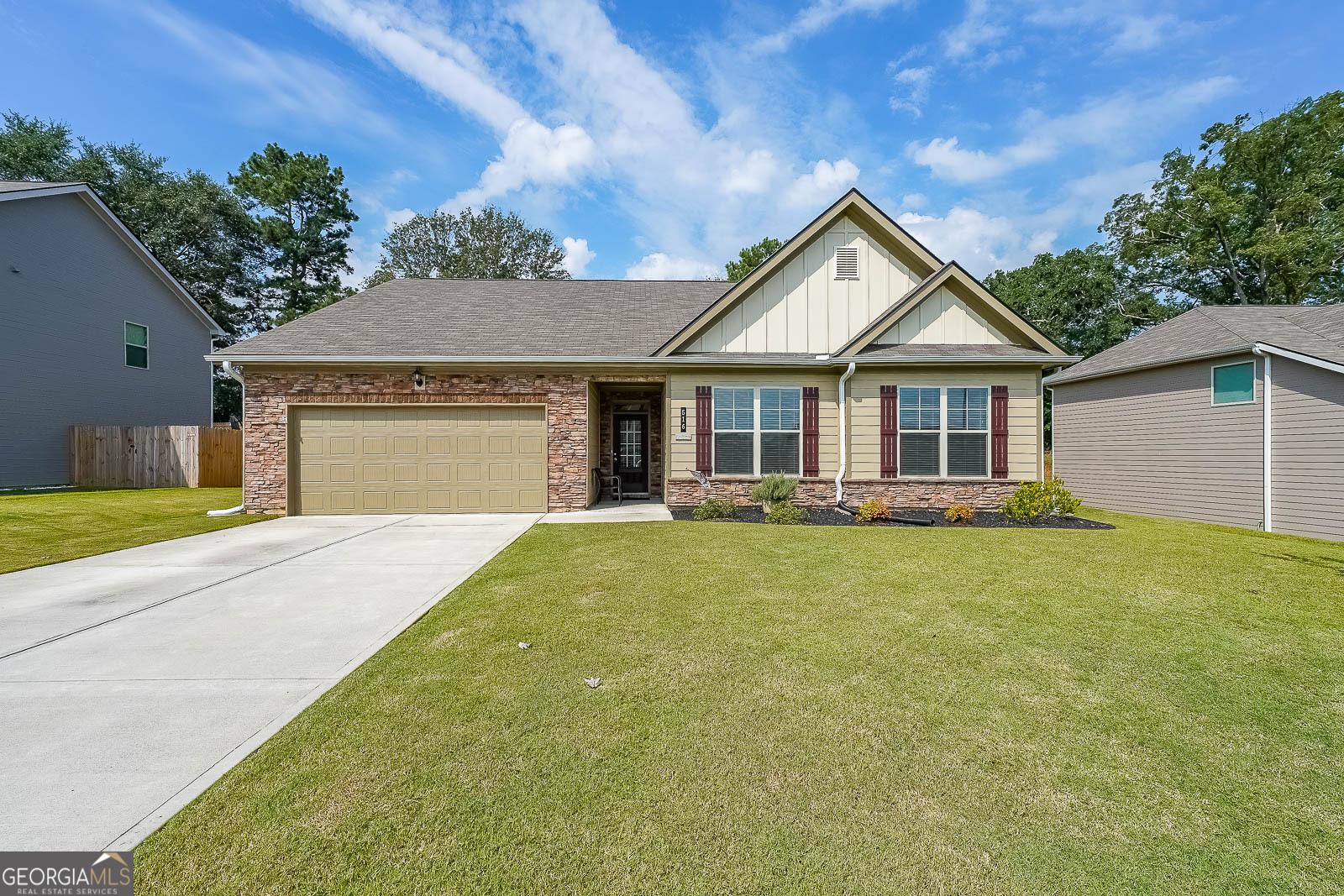 Welcome to 516 McGinnis Cir in Calhoun! Built in 2022, this beautifully designed 3-bed, 2-bath ranch home offers the perfect blend of style, comfort, and functionality. With 1,815 sq ft of open-concept living space, this home is ideal for both everyday living and entertaining. Step inside to find a spacious family room with a fireplace, and a bright, modern kitchen featuring 42" cabinets, granite countertops, subway tile backsplash, and a large 6-foot island overlooking the living area. Enjoy your morning coffee in the breakfast nook or step out to the covered patio for easy indoor-outdoor living. The private owner's suite boasts an oversized bedroom with a spa-like bath complete with granite countertops and SPC tile flooring. A split-bedroom layout ensures privacy for family or guests. Located in the sought-after Henderson Glenn community, this home combines modern finishes with the convenience of Calhoun living-just minutes from schools, shopping, and I-75.