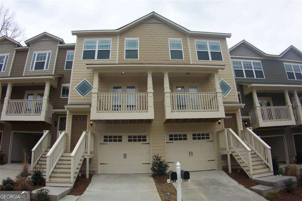 Awesome townhouse located in an great gated complex with security guard. Hardwoods throughout main level. Open kitchen with stained cabinets, island, pantry and granite counter tops. Family room with double glass French doors out to a front Juliette balcony. 2 vaulted bedrooms up, each with private bathroom. Laundry upstairs. Drive under 1 car garage. Unfinished basement room perfect for storage. Rear deck and backyard. The complex has a dog park and pool.