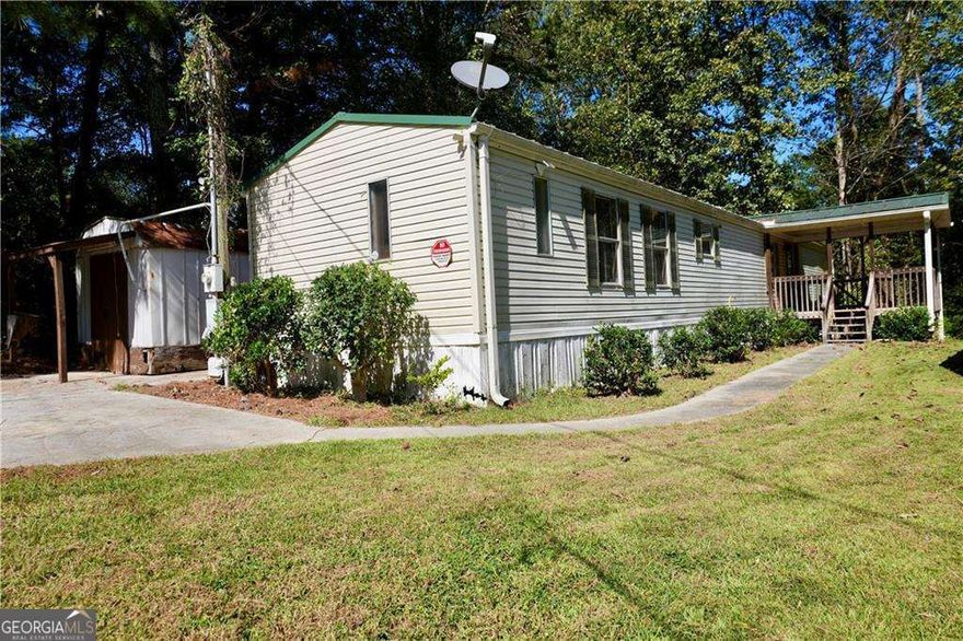 LOCATION! Investor Special or Ideal Starter Home in Acworth, GA  Opportunity knocks! Whether you're looking for a fix & flip, rental investment, or affordable primary residence, this 3 bed, 2 bath mobile home is packed with potential. Situated on a peaceful half-acre lot, this property offers the best of both worlds: tranquility and convenience. Prime Location  Just minutes from Lake Allatoona, Red Top Mountain, I-75, and the LakePoint Sports Complex, this home is in a high-demand area that continues to grow in value. * Home Features 1,064 sqft of living space, and is set on a permanent foundation, metal roof, brand new plumbing throughout, spacious covered front porch for relaxing outdoor living. On the exterior you will find additional storage buildings, one with a built in workshop and benches. This home needs some TLC, but with a strong structure and major updates already completed, it's a perfect opportunity to add value. Sold AS IS. This home offers excellent rental potential in an affordable entry into a growing market. Ideal for cash buyers seeking a quick return Don't miss out on this value-packed property with endless potential in sought-after Acworth! Reach out today to schedule a showing or submit an offer.