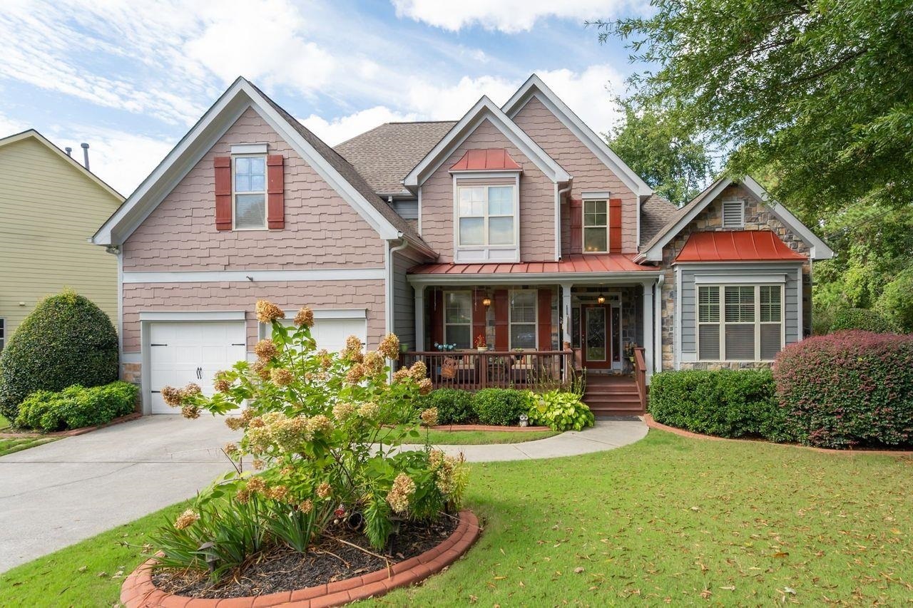 Absolutely Stunning Craftsman Home In Sought-After Allatoona High School District! This 6 Bedroom, 4 Bathroom Home Features A Covered Rocking Chair Front Porch That Welcomes You Into The 2-Story Foyer. Main Level Offers A Separate Dining Room (Seats 12+), Office/Flex Room With A Full Bathroom, Oversized Master-On-Main With Trey Ceiling & Sitting Area, A Luxurious Master Suite Featuring His/Her Sinks, Separate Tiled Tub/Shower & His/Her Walk-In Closets. You Will Love The Beautiful Chef's Kitchen With Granite Countertops, Stainless Steel Appliances, Kitchen Island, Eat-In Kitchen, & View To Family Room With Fireplace. Upper Level Includes 3 Spacious Secondary Bedrooms & Full Bathroom With Double Vanity. Lower Level Features A Full Finished Basement With A Media Room, Game Room/Rec Room, 2 Bedrooms, A Full Bathroom & Large Storage Area On The Rear Of The Home With A Separate Entry! This Home Boasts A Beautiful Fenced-In Backyard -- Perfect For Both Relaxing & Entertaining! Unbeatable Location - Near Schools, Shopping, Restaurants, Entertainment & More! Welcome HOME!