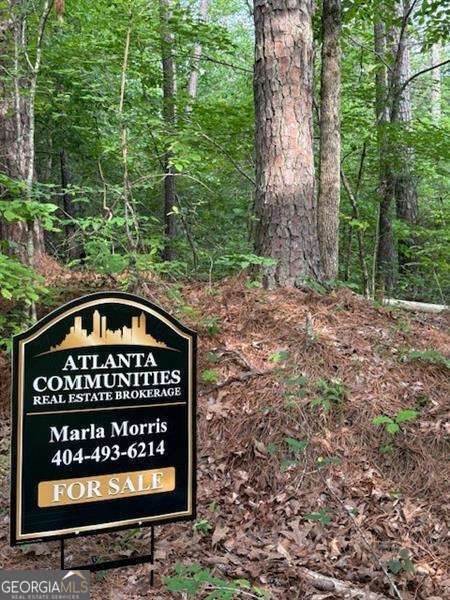 PRIVACY at itCOs best, come build your private estate on this beautiful 2.38 acre lot right off of Hwy 61 and in the sought after North Paulding High School District. Live among the wildlife that also includes a creek along the back side of the property. Very convenient to family amenities like Burnt Hickory Park, Lake Point Sports Complex, and downtown Dallas. The city of Cartersville is also a short drive away with tons of shopping, entertainment and restaurants. Tract is gently rolling and would be a great basement lot. There are already several high-end estates along Narroway Trail, no HOA, and did I say how very private this Tract is? Narroway Church Spur road will be completed for ingress/egress off of Narroway Church Road once there are plans to develop any of the several tracts on this county road. NOTE: Buyer is responsible for conducting survey, soil test, perc test and to verify any concerns with the county. If you want to build, please verify needed information from the county. The new water reservoir is nearby, so water hook up might possibly be available now or in the near future.