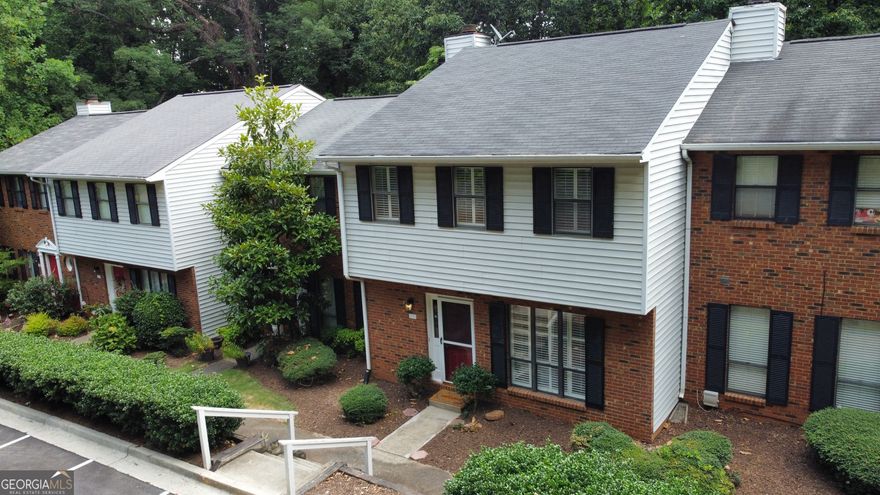 Step into your slice of paradise in Alpharetta's enchanting Jamestowne community! This breathtaking, meticulously reimagined townhome is a vibrant masterpiece, nestled just a leisurely stroll from the dazzling Avalon and the quaint, historic charm of downtown Alpharetta.    Sprawling across two luminous stories, this exquisite residence boasts 3 expansive bedrooms and 2.5 opulent bathrooms, crafted for indulgent living. The airy, open-concept layout invites you to bask in its grandeur, with a state-of-the-art eat-in kitchen that's a culinary dream-gleaming with pristine cabinetry, lustrous granite countertops, a captivating backsplash, and sparkling stainless steel appliances.    Savor cozy evenings by the inviting gas log fireplace in the radiant living area, or host unforgettable gatherings in the elegant dining space, complete with a versatile nook for your chic home office-all on the main level. Ascend to the palatial master suite, a serene haven featuring cavernous closets and a luxurious, spa-like bathroom. Convenient full-size washer and dryer hookups elevate everyday ease.    Venture outside to your secluded backyard retreat, where a sprawling, sun-dappled deck is framed by majestic trees-perfect for tranquil mornings or lively soirees. A practical outdoor storage room and abundantgrossing parking complete this idyllic setting. With its voluminous rooms, dazzling modern touches, and an unrivaled location near premier shopping, gourmet dining, and electrifying entertainment, this townhome is a rare jewel.    Seize the chance to claim this extraordinary lifestyle-schedule your private tour today and fall in love with Alpharetta's most captivating gem!