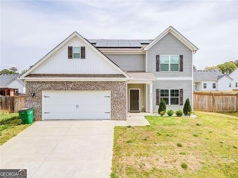 Photo of 315 Soldiers Pathway, Calhoun, GA 30701 (MLS # 10730659)