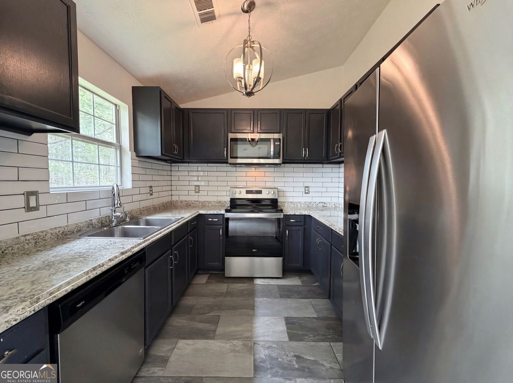 Photo of 835 Sinclair Way, Jonesboro, GA 30238 (MLS # 10723089)