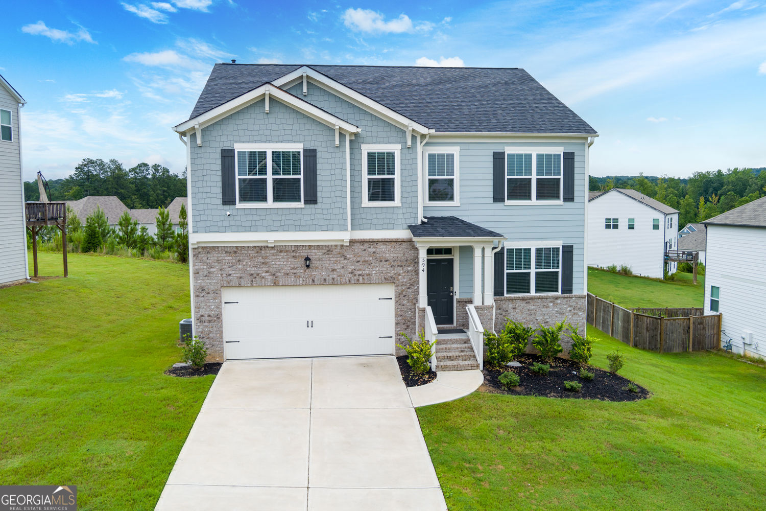 At 594 Sweet Bay Lane, life feels connected to both nature and home! Just minutes from Lake Acworth and Kennesaw Mountain, this nearly-new Sienna Forest beauty welcomes you with an open main level where everyone naturally gathers. The living room's fireplace invites cozy nights in, while the bright kitchen complete with island, subway tile backsplash, stainless steel appliances, and a walk-in pantry makes everyday cooking a joy. A bedroom and full bath on this level are perfect for guests or anyone who prefers easy access without stairs. Upstairs, the loft offers a casual hangout space, flanked by four comfortable bedrooms, including a primary suite with a walk-in closet you could almost get lost in. Downstairs, the unfinished basement is a blank canvas gym, media room, workshop, you decide. Outside, the .23-acre lot gives you room to breathe, and with quick access to highways, your favorite trails, and the lake, adventure is always close by! $50 Application Fee: Rent Spree Application: https://apply.link/7JGp8Pg