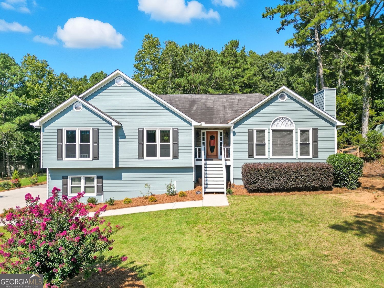 This home has the space, layout, and flexibility you've been looking for-and it's set on over half an acre in a swim and tennis community. From the vaulted ceilings and sunroom to the finished basement and fenced backyard, every part of this home is built for living well. Inside, the main level welcomes you with a light-filled living room, a gas fireplace, and tall windows that make the space feel open yet cozy. A formal dining room sits just off the foyer, anchored by a bay window that adds warmth and charm to every gathering. The kitchen combines function and style with granite countertops, stainless steel Samsung appliances, white cabinets, and a casual dining nook that overlooks the backyard. The inviting sunroom extends your living space year-round-ideal for morning coffee, evening drinks, or simply recharging in peace. Three bedrooms and two full bathrooms round out the main floor, including a spacious primary suite with tray ceiling, walk-in closet, and private bath featuring a dual-sink vanity, soaking tub, and separate shower. Downstairs, the finished basement offers serious flexibility with a large bonus room, additional flex space, and plenty of storage. Whether you're working from home, hosting guests, or needing space for hobbies-this level is ready. An oversized two-car garage adds extra function. Outside, the fully fenced backyard is ready for play, pets, or a garden project. And with access to a community pool, tennis courts, and playground, you're never far from fun or fresh air.