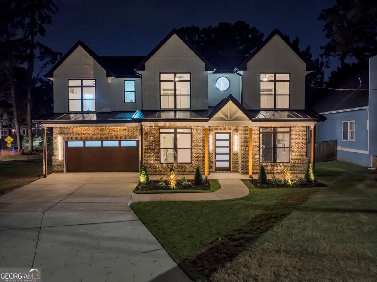 Step into exceptional design and peak luxury with this custom new construction modern farmhouse by Khari Custom Homes featuring Smart Home upgrades in one of Atlanta's most sought-after locations. Offering 5 bedrooms, 4.5 bathrooms, and two levels of spacious living, this home is designed for both comfort and high-end entertaining. This exquisite residence boasts three master suites, including one on the main level with a full bathroom and two additional master suites upstairs. The open floor plan is flooded with natural light and welcomes you with a grand two-story foyer, separate formal living/office, and elegant dining room. 10 ft. ceilings on the main level with 8 ft. doors. The chef's dream kitchen is a showstopper, complete with smart appliances, kitchen island, stone countertops, a deep sink, LED under-cabinet lighting, and striking black & gold accents, walk in pantry. The kitchen flows seamlessly into the family room with a cozy fireplace and a keeping room overlooking a covered patio and large private backyard-ideal for entertaining. The upper level features four spacious ensuite bedrooms, three full bathrooms, and a large media/bonus room that can be used as the 6 bedroom, perfect for a home theater, office, or additional indoor recreation. The luxurious owner's suite offers a private retreat with a huge custom California-style closet, double vanities, a walk-in frameless shower, and an elegant soaking tub. Designed for modern convenience, this home includes laundry rooms on both levels and stunning walnut hardwood floors throughout. Situated on a large corner lot with no HOA, the exterior is just as impressive as the interior, offering masterfully crafted finishes, raised back porch with the patio and pergola. Security system. Located just minutes from the Atlanta BeltLine, Mercedes-Benz Stadium, Georgia Aquarium, Coca-Cola Museum, public library, golf course and top downtown entertainment & dining, this home is at the center of it all. Easy access to I-20, Marta, and less than 20 minutes from Hartsfield-Jackson International Airport and Stone Mountain park. Experience the perfect blend of sophistication, elegance, and functionality. This is a rare opportunity to own a one-of-a-kind luxury home in the heart of Atlanta