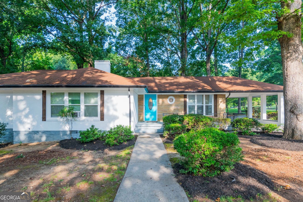 Photo of 5165 WOODLAND Drive, FOREST PARK, GA 30297 (MLS # 10805452)