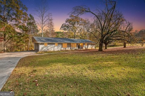 Photo of 3150 Stonewall Tell Road, Atlanta, GA 30349 (MLS # 10656917)