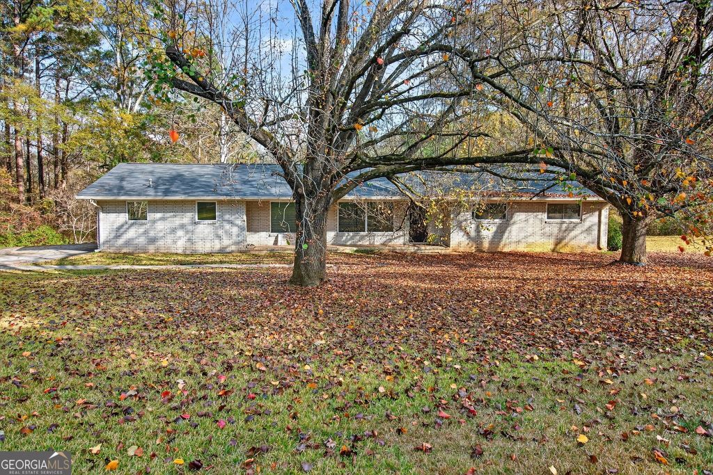 Photo of 3150 Stonewall Tell Road, Atlanta, GA 30349 (MLS # 10656917)