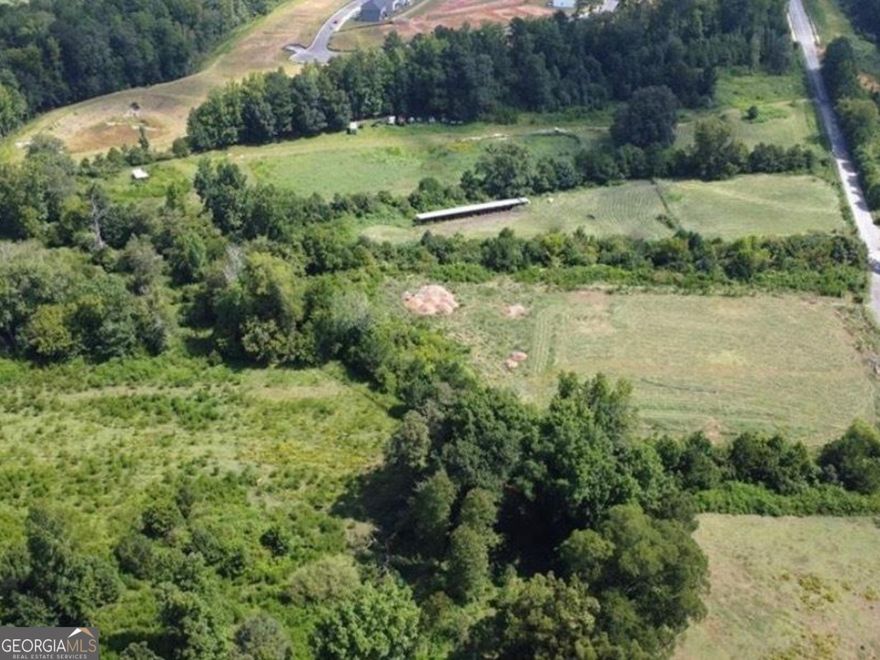 FANTASTIC OPPORTUNITY IN A PRIME LOCATION!  The proximity to Hartsfield Jackson Airport, combined with the upcoming Aerotropolis development and the $300 million dollar Cedar Grove Village complex, makes this parcel incredibly appealing for your future development project. This land is nestled between the city of South Fulton and Union City, and steps away from Chattahoochee Hills. This high demand location is waiting for the right developer. Currently with mixed-use developments nearby - restaurants, entertainment, apartments and a park it will attract both residents and visitors alike.   THIS parcel is the last 31 acres available in the area. Don't miss out on this opportunity. So many options for the right developer.    Aerial legion for photo can be found in additional information.