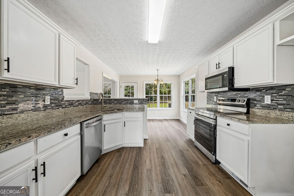 Photo of 1709 Wyntercreek Lane, Hoschton, GA 30548 (MLS # 10875709)