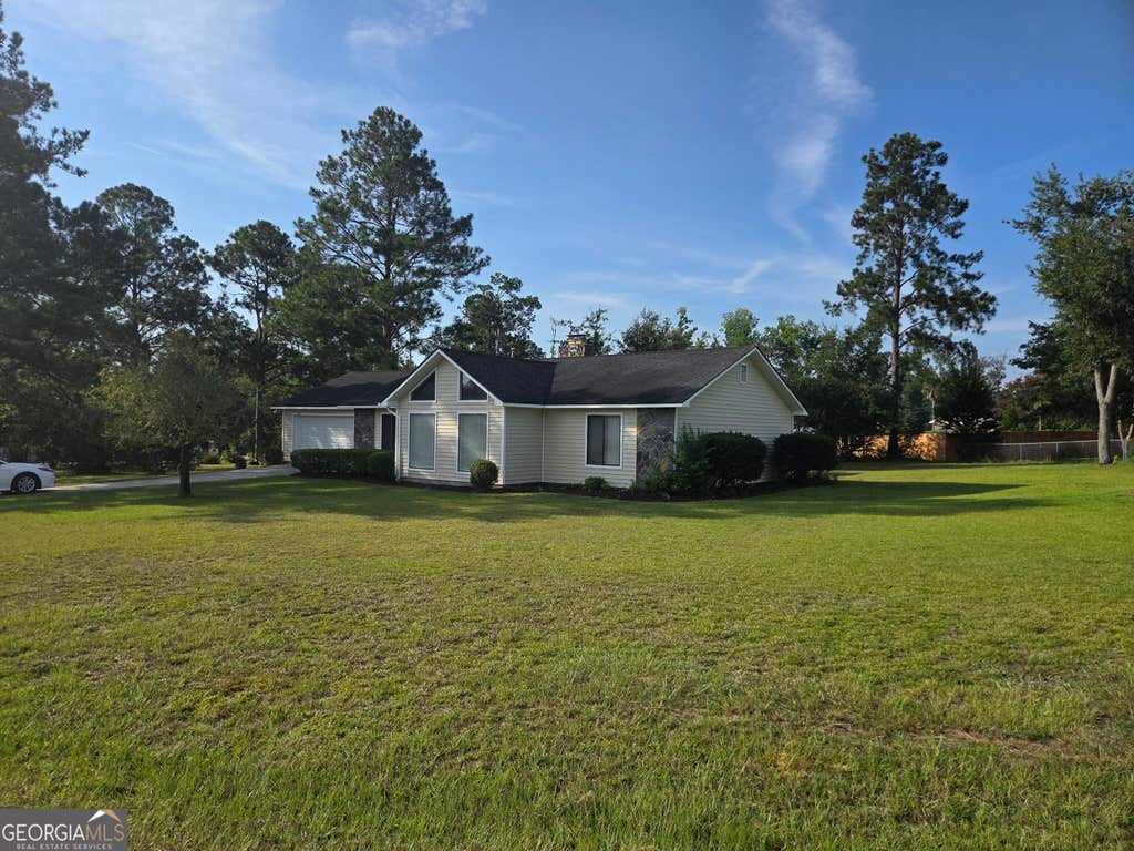 Photo of 1322 Woodlawn Circle, Vidalia, GA 30474 (MLS # 10828718)