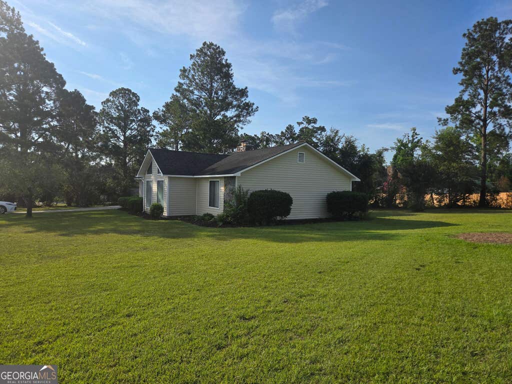 Photo of 1322 Woodlawn Circle, Vidalia, GA 30474 (MLS # 10828718)