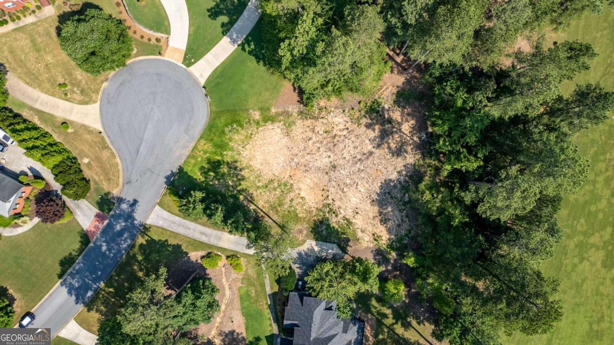 Beautiful building lot in The Fairways Subdivision in the Armuchee area. This lot is one of the few that remain in this exclusive development, and it is situated on the #6 fairway of the beautiful Stonebridge Golf Course. It is also the last vacant lot in this quiet cul-de-sac. If you've ever wanted to build a home, and live on the golf course, this is your opportunity. Seller bought this lot with intensions to build a beautiful custom home then found a turnkey ready home that met their wants and needs in this community. We have 3 floorplans available from the builder in this community are included in the photos as well as a variety of customizable house plans for your selection. Schedule your appointment today before it is gone.